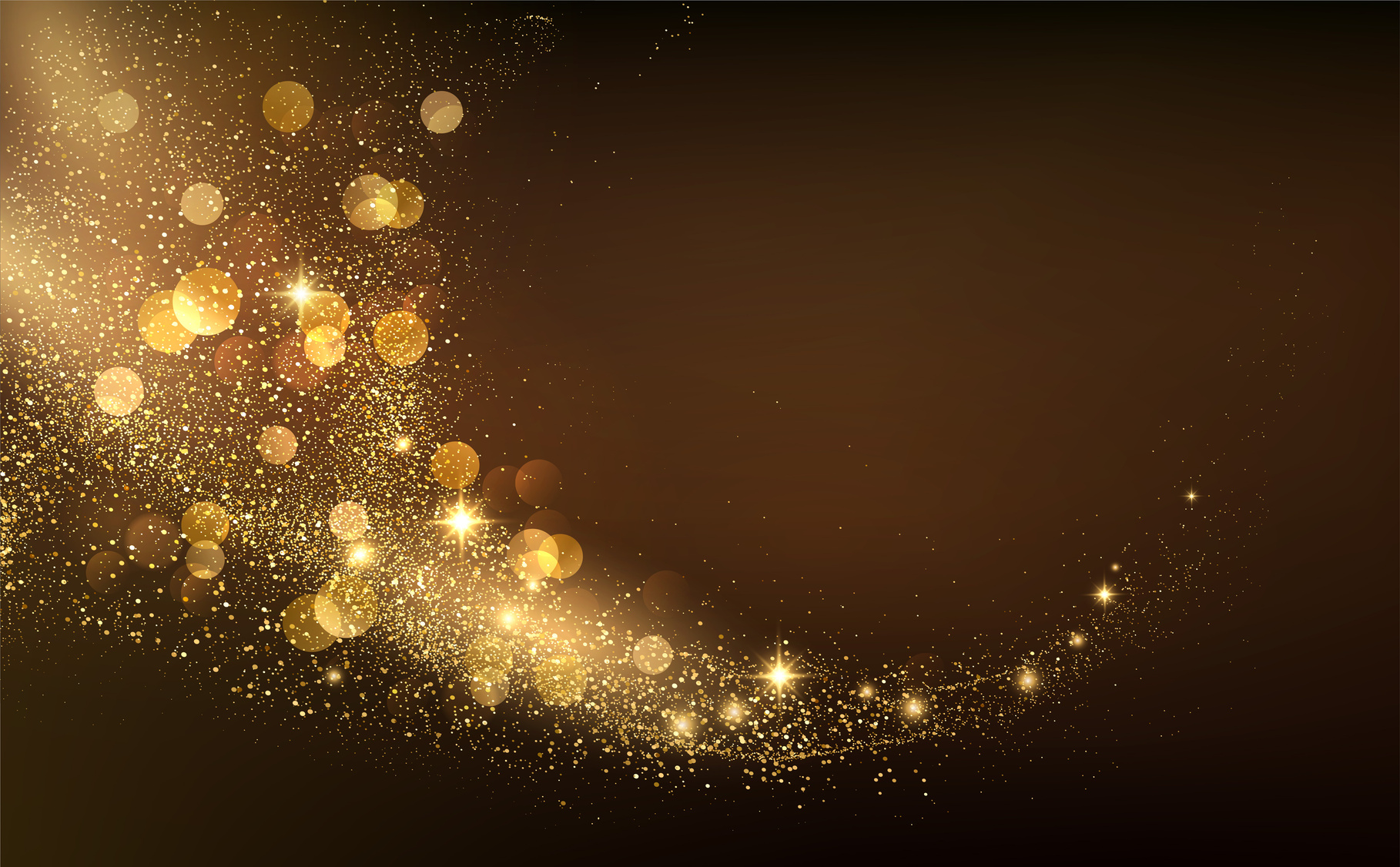 golden sparkles on a black background